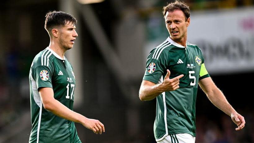 Paddy McNair and Jonny Evans