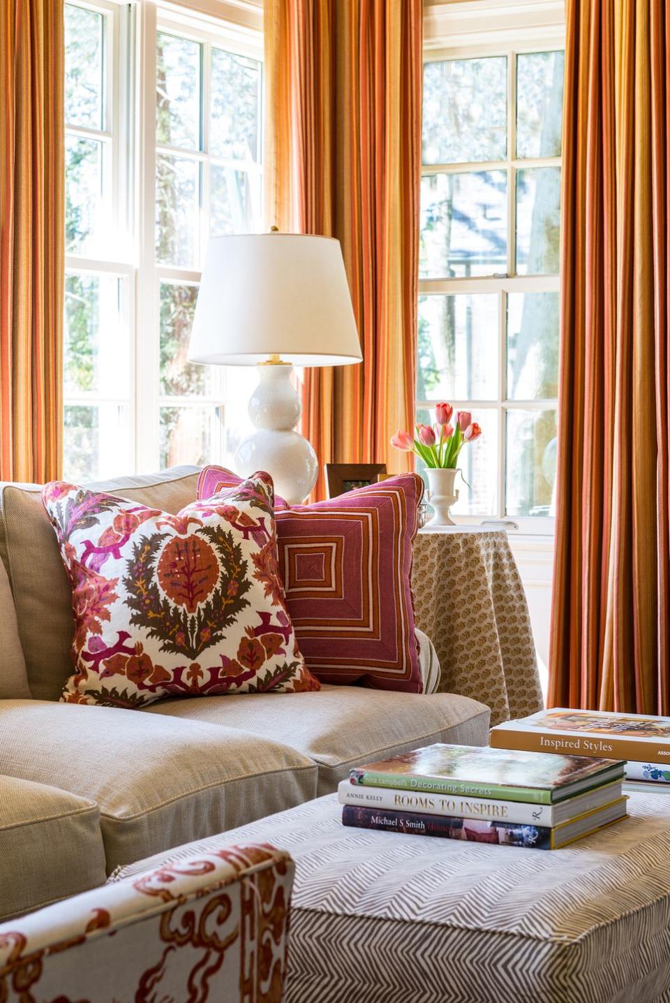 <p>"Combining the warmth of orange hues with shades of pinks and yellows brings the color of sunshine indoors and is ideal for long summer days."<em> — Marika Meyer, <a href="https://meyerinteriors.com/" rel="nofollow noopener" target="_blank" data-ylk="slk:Marika Meyer Interiors;elm:context_link;itc:0;sec:content-canvas" class="link ">Marika Meyer Interiors</a></em></p>