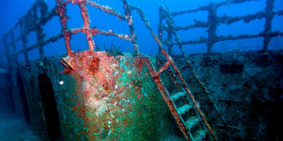 An undated image of the rusted wreck of the USS Spiegel Grove, showing a metal staircase and rail, in Key Largo, Florida