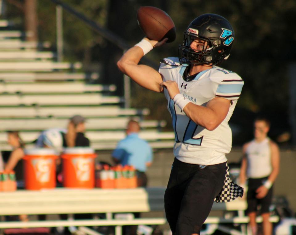 Ponte Vedra quarterback Ben Burk (12) throws the ball during warm-ups before a high school football game at Bishop Kenny on October 7, 2022. [Clayton Freeman/Florida Times-Union]