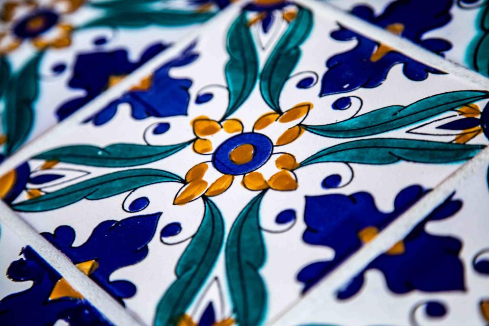 Tunisian tiles that were hand-painted to match the patterns in Mar-a-Lago were used on bench tops for the restored Marjorie Post Causeway Memorial.