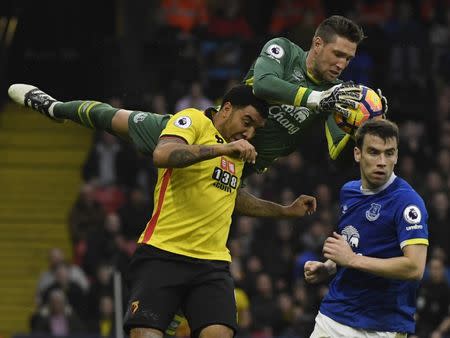 Football Soccer Britain - Watford v Everton - Premier League - Vicarage Road - 10/12/16 Everton's Maarten Stekelenburg gathers from Watford's Troy Deeney as Seamus Coleman looks on Reuters / Toby Melville Livepic EDITORIAL USE ONLY. No use with unauthorized audio, video, data, fixture lists, club/league logos or "live" services. Online in-match use limited to 45 images, no video emulation. No use in betting, games or single club/league/player publications. Please contact your account representative for further details.