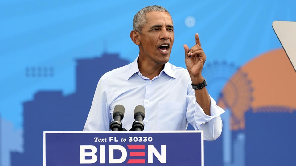 Former President Barack Obama speaks at a rally as he campaigns for Democratic presidential candidate former Vice President Joe Biden Tuesday, Oct. 27, 2020, in Orlando, Fla. (John Raoux/AP)