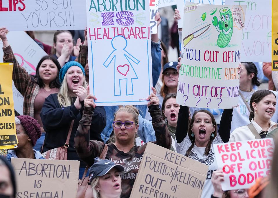 Hoosiers gathered to protest the leaked opinion of the Supreme Court considering overturning the ruling of abortions Tuesday, May 4, 2022, at Monument Circle in Indianapolis. Protestors for abortion-rights were met with counter protesters in favor of overturning Roe v. Wade.