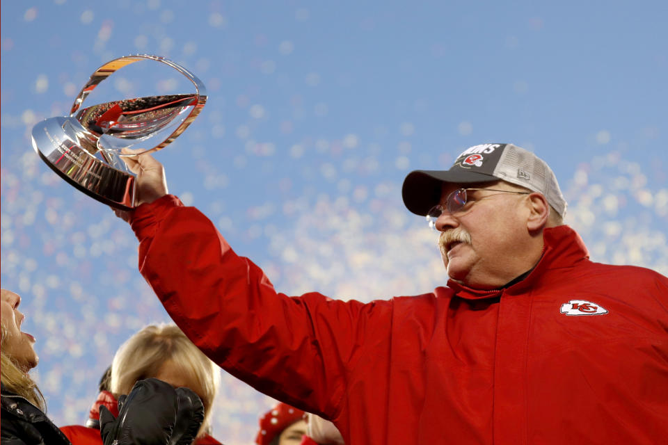 Kansas City Chiefs head coach Andy Reid holds the Lamar Hunt Trophy after the NFL AFC Championship football game against the Tennessee Titans Sunday, Jan. 19, 2020, in Kansas City, MO. The Chiefs won 35-24 to advance to Super Bowl 54. (AP Photo/Jeff Roberson)
