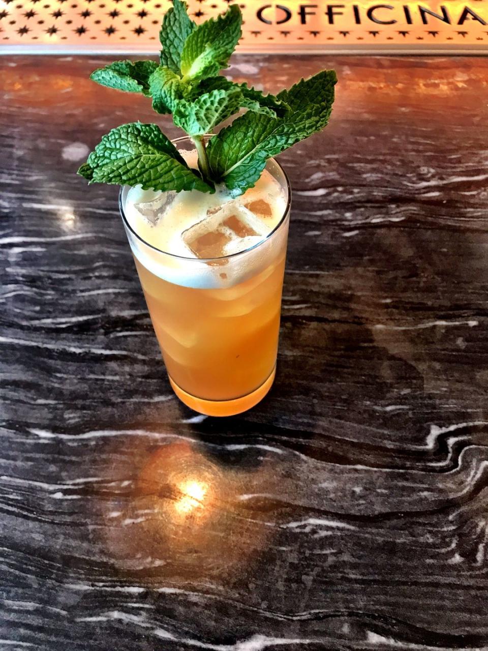 <p><strong>Ingredients</strong> </p><p>1.5 oz bourbon <br>.5 oz Braulio <br>.75 oz lemon <br>.5 oz honey syrup <br>6 mint leaves <br>2 dash of Angostura bitters <br>1 oz of soda water</p><p><strong>Instructions</strong><br></p><p>Combine all ingredients except soda water in a shaker tin with ice and shake. Strain into a Collins glass with ice and a mint sprig.</p><p><em>From <a href="https://www.officinadc.com/" rel="nofollow noopener" target="_blank" data-ylk="slk:Officina;elm:context_link;itc:0;sec:content-canvas" class="link ">Officina</a> in Washington D.C.</em></p>