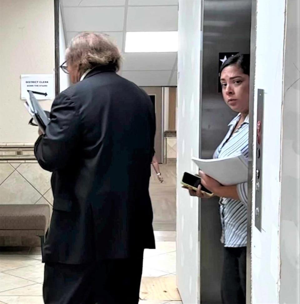 Justine Brittany Gallegos, right, leaves an elevator at the Wichita County Courthouse with defense attorney Bob Estrada after a day of jury selection for her intoxication manslaughter trial Monday, Aug. 21, 2023. The Lawton, Oklahoma, woman is charged in connection with the death of Pimporn C. Kasemthaveetsak of Burkburnett in a 2019 crash.