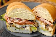 <p><strong>Fried Walleye Sandwich</strong></p><p>Walleye is the official fish of Minnesota, so it’s only right to fry it and put it into a sandwich. Try <a href="https://www.macsfishchipsstrips.com/" rel="nofollow noopener" target="_blank" data-ylk="slk:Mac’s Fish and Chips;elm:context_link;itc:0;sec:content-canvas" class="link ">Mac’s Fish and Chips</a> who serves the classic sandwich -- battered and fried with pickles, lemon and tartar sauce. </p>