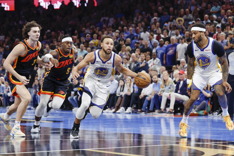 Nov 3, 2023; Oklahoma City, Oklahoma, USA; Golden State Warriors guard Stephen Curry (30) drives to the basket against the Oklahoma City Thunder during the second half at Paycom Center. Mandatory Credit: Alonzo Adams-USA TODAY Sports