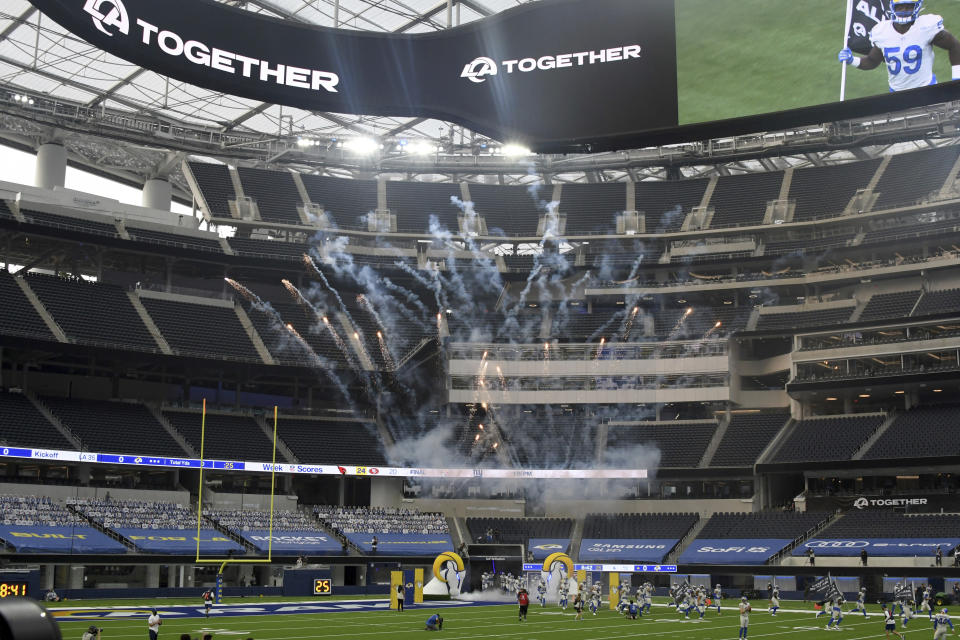 Los Angeles Rams take the field in front of an empty stadium prior to a NFL football game against the Dallas Cowboys on opening night at SoFi Stadium in Inglewood on Sunday, September 13, 2020. (Keith Birmingham/The Orange County Register via AP)