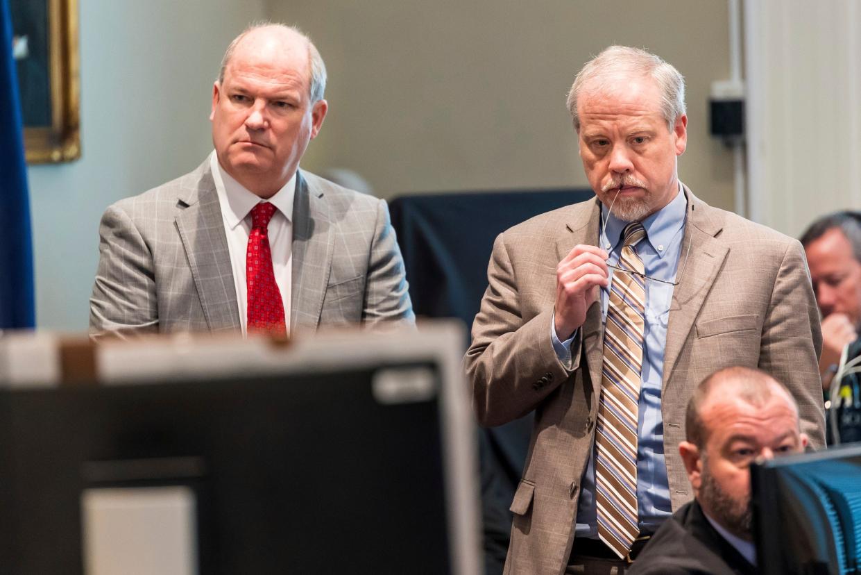 Defence attorney Jim Griffin and prosecutor Creighton Waters listen to testimony during Alex Murdaugh’s double murder trial (AP)