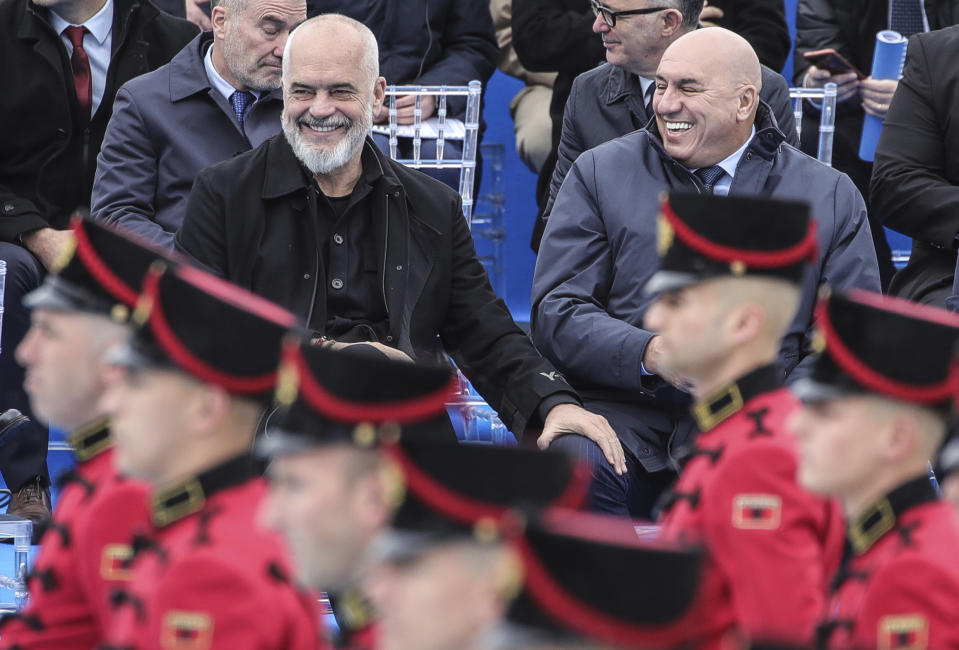 Albania's Prime Minister Edi Rama, left, and Italy's Defence Minister Guido Crosetto attend an inauguration ceremony at an airbase in Kocuve, about 85 kilometers (52 miles) south of Tirana, Albania, Monday, March 4, 2024. NATO member Albania inaugurated an international tactic air base on Monday, the Alliance's first one in the Western Balkan region. (AP Photo/Armando Babani)