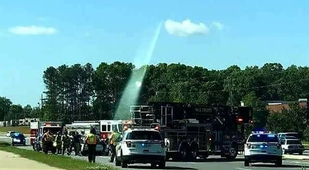 A weird beam of light can be seen over the crash site. Source: Facebook