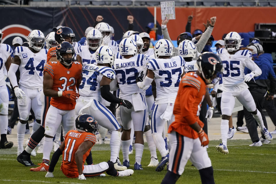 Indianapolis Colts' Julian Blackmon (32) celebrates with teammates after an interception during the second half of an NFL football game against the Chicago Bears, Sunday, Oct. 4, 2020, in Chicago. (AP Photo/Nam Y. Huh)