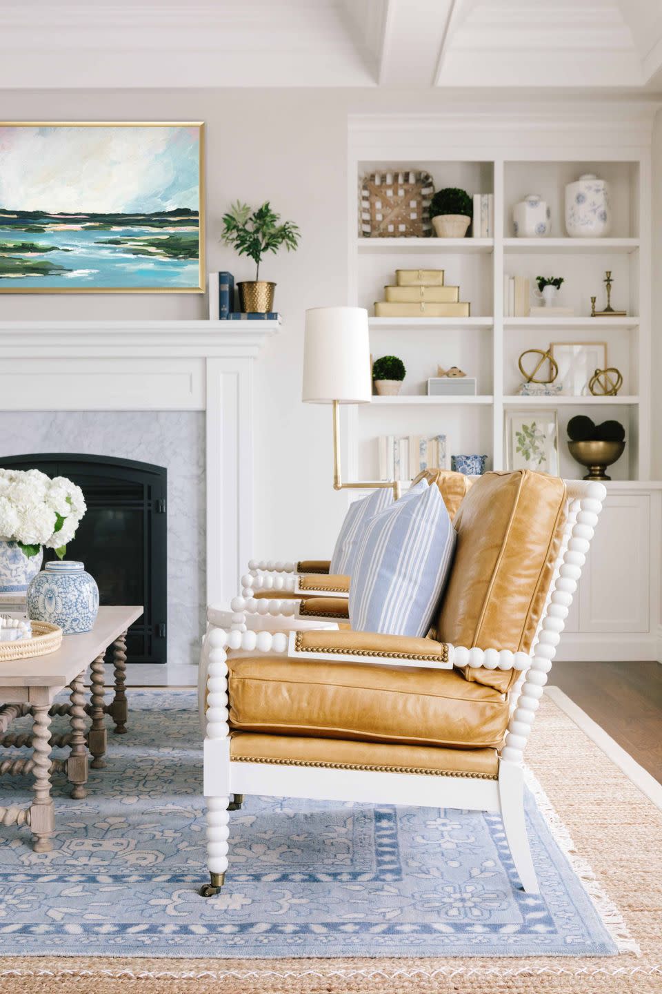 <p>Rich caramel leather isn't just for dark, somber studies—in a family room designed by <a href="https://www.housebeautiful.com/design-inspiration/house-tours/a27114539/bria-hammel-home-tour/" rel="nofollow noopener" target="_blank" data-ylk="slk:Bria Hammel;elm:context_link;itc:0;sec:content-canvas" class="link ">Bria Hammel</a>, it's gorgeous paired with cornflower blue.</p>