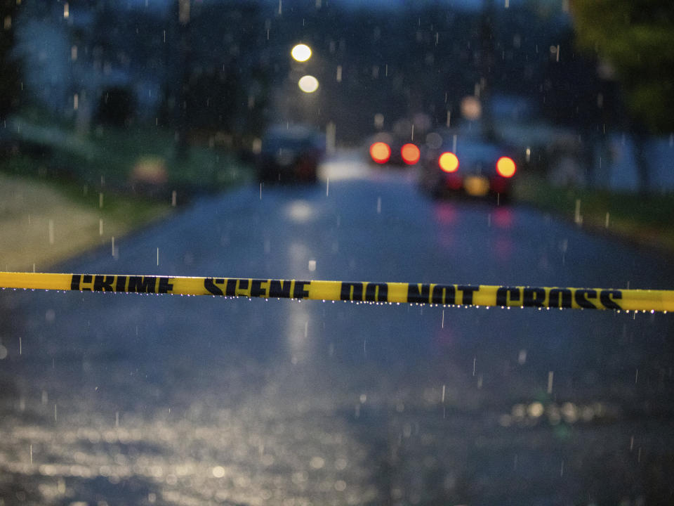 A storm moves up Reinoehl St. through Lebanon City after three policemen were shot by a 34-year-old suspect in Lebanon, Pa., Thursday, March 31, 2022. A Pennsylvania police officer was killed and two others injured Thursday during a shooting that occurred while responding to a domestic disturbance call, Lebanon Mayor Sherry Capello said.(Mark Pynes/The Patriot-News via AP)