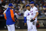 New York Mets starting pitcher Max Scherzer (21) talks to teammates during the sixth inning of a baseball game against the St. Louis Cardinals on Wednesday, May 18, 2022, in New York. (AP Photo/Frank Franklin II)