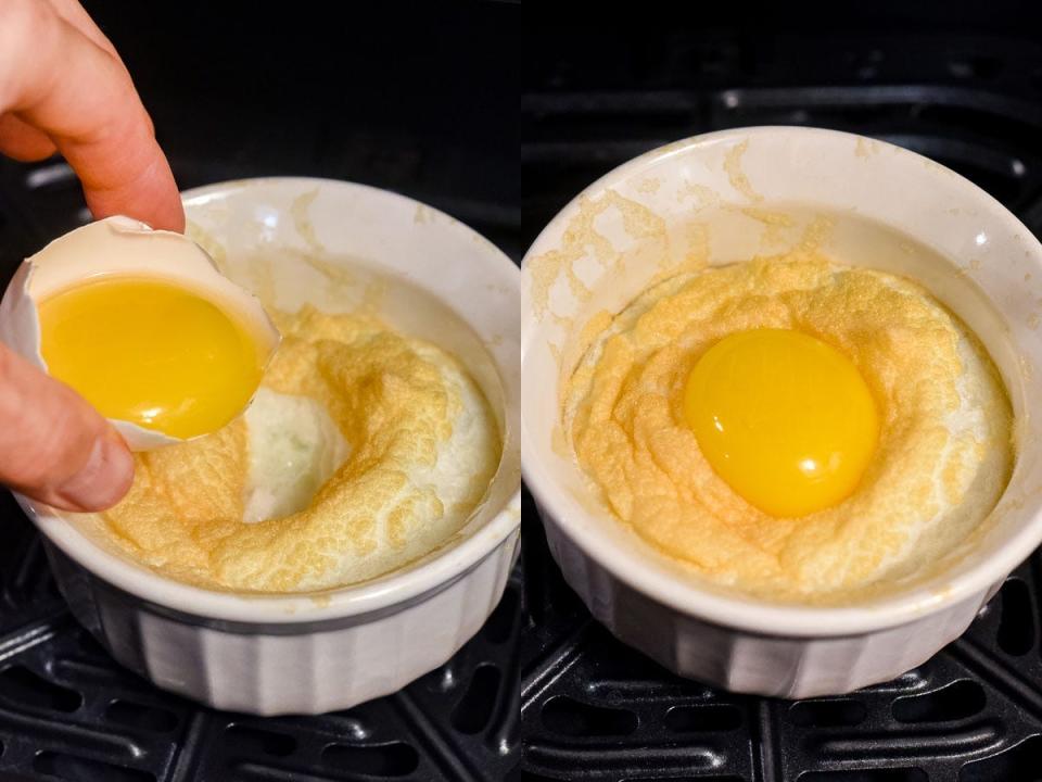 Hand placing egg yolk inside air-fried eggs.