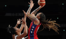 United States' Brittney Griner (15), right, shoots over Nigeria's Pallas Kunaiyi-Akpanah (3) during women's basketball preliminary round game at the 2020 Summer Olympics, Tuesday, July 27, 2021, in Saitama, Japan. (AP Photo/Charlie Neibergall)