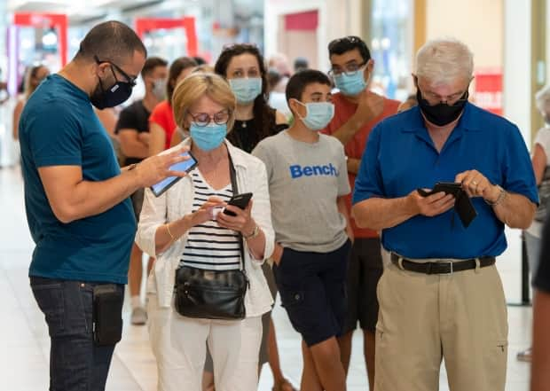 The Saskatchewan Health Authority will require families and visitors to properly wear medical masks at all times within health-care facilities and long-term care homes.  (Ryan Remiorz/The Canadian Press - image credit)