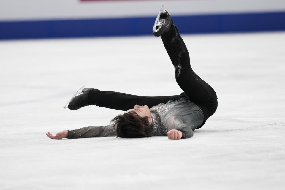 Shoma Uno of Japan reacts after his performance in the men's free skating program in the World Figure Skating Championships in Saitama, north of Tokyo, Saturday, March 25, 2023. (AP Photo/Hiro Komae)