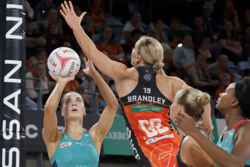 Kiera Austin and April Brandley, pictured here in action during the GWS Giants' clash with Melbourne Vixens.