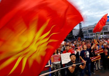 Protestors shout slogans against the change of the country's constitutional name in front of the Parliament building in Skopje, Macedonia June 23, 2018. REUTERS/Ognen Teofilovski