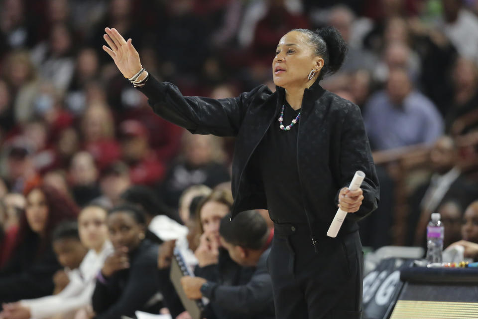 South Carolina head coach Dawn Staley gestures to players during the first half of an NCAA college basketball game against Alabama on Thursday, Feb. 22, 2024, in Columbia, S.C. (AP Photo/Artie Walker Jr.)