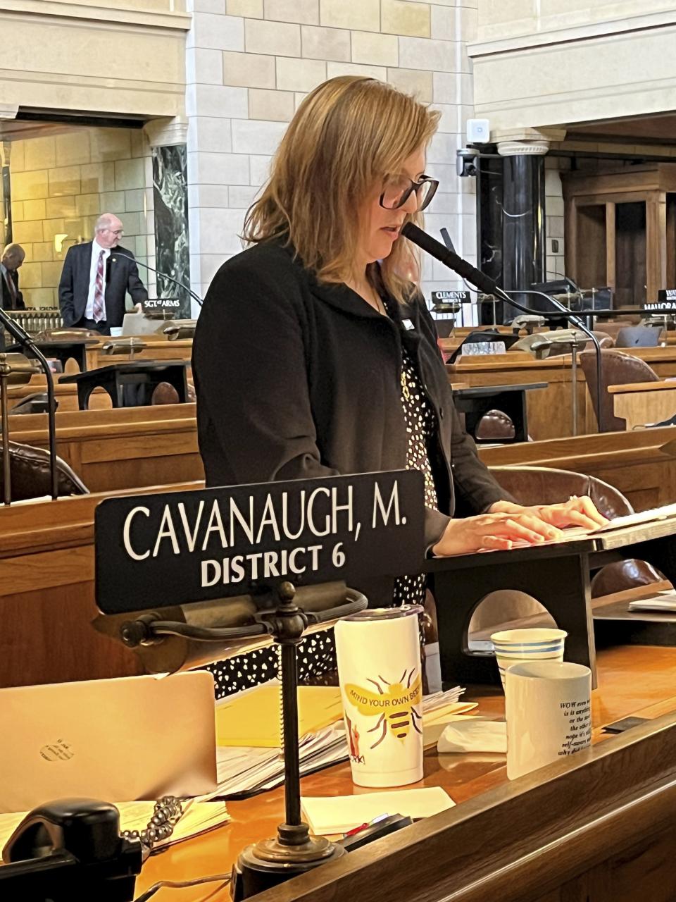 State Sen. Machaela Cavanaugh speaks before the Nebraska Legislature Monday, March 13, 2023, at the Nebraska State Capital in Lincoln, Neb. Cavanaugh is in her third week of an effort to filibuster every bill that comes before the Legislature this session — even the ones she supports. The effort is a protest against conservatives' advancement of a bill that would outlaw gender-affirming therapies for those 18 and younger. Cavanaugh has declared she will "burn the session to the ground" in an effort to stymie the bill. (AP Photo/Margery Beck)