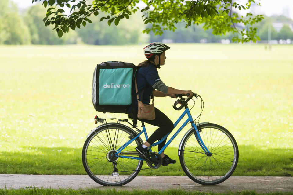 CARDIFF, UNITED KINGDOM - JUNE 16: A Deliveroo rider cycles through Bute Park in Cardiff on June 16, 2019 in Cardiff, United Kingdom. (Photo by Matthew Horwood/Getty Images)