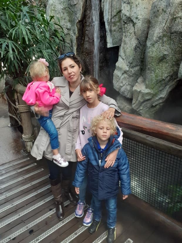 Daylen Garcia Lopez is seen here at the Calgary Zoo with her two younger children, who are with her in Cuba, and her husband's daughter from a previous relationship.