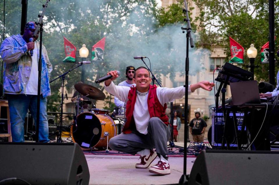 Rappers perform with the Sacramento band Lab Rats during opening night of the Concerts in the Park series on Cinco de Mayo at Cesar Chavez Plaza.