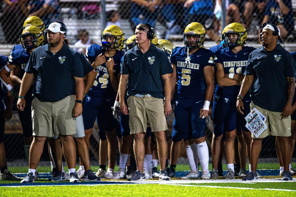 Kingfisher head coach Jeff Myers stands on the sidelines during a home game between Kingfisher High School and Clinton High School in August.