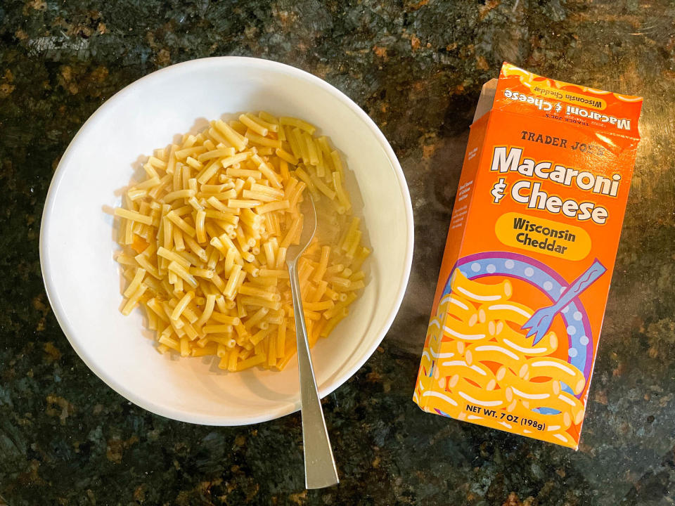 Bowl of Trader Joe's macaroni 'n' cheese next to its box