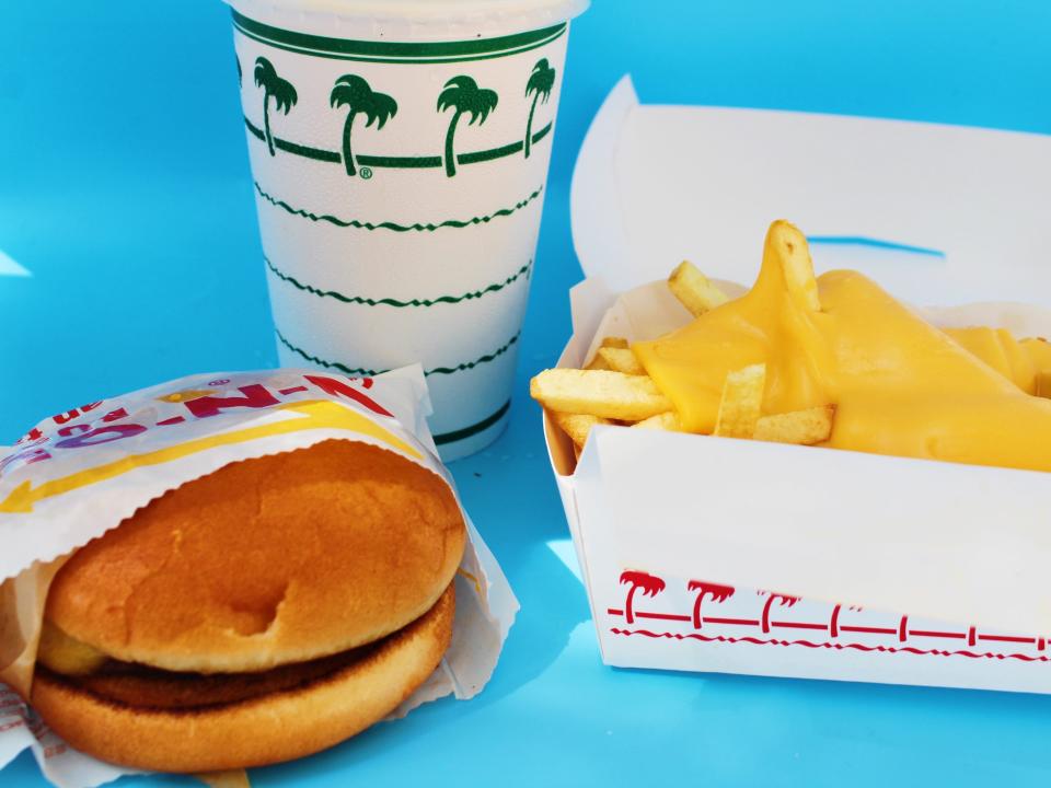 in n out kim kardashian meal cheeseburger, cheese fries, and shake