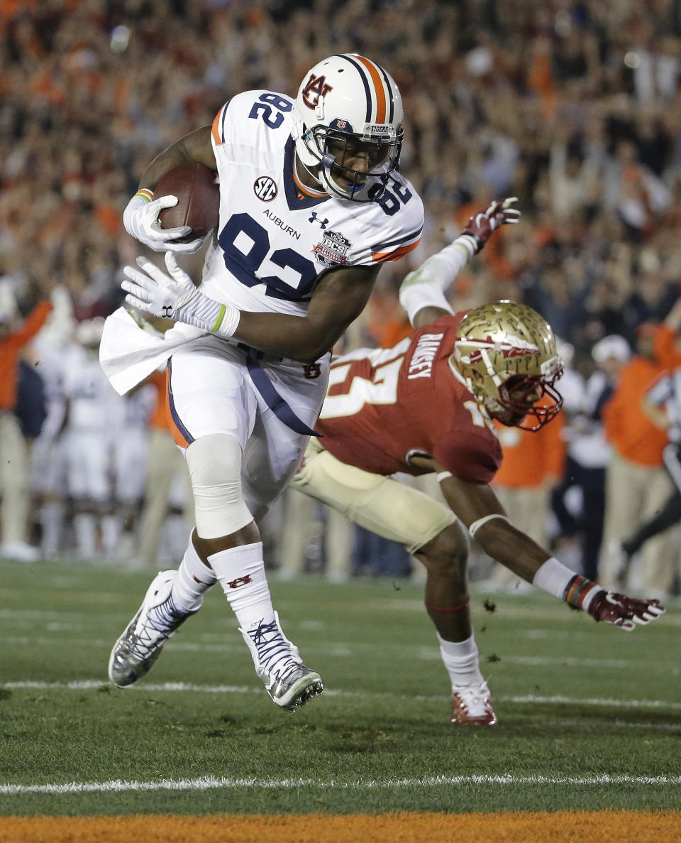Auburn's Melvin Ray gets past Florida State's Jalen Ramsey (13) for a touchdown catch during the first half of the NCAA BCS National Championship college football game Monday, Jan. 6, 2014, in Pasadena, Calif. (AP Photo/Chris Carlson)