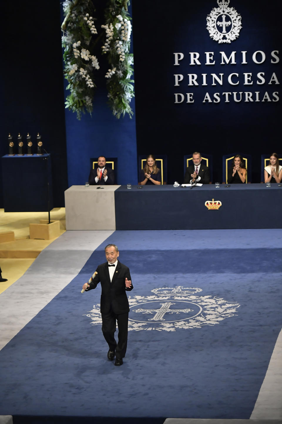 Japanese author Haruki Murakami reacts after receiving the Princess of Asturias Award for Literature during the awards ceremony in Oviedo, northern Spain, Friday, Oct. 20, 2023. The awards, named after the heir to the Spanish throne, are among the most important in the Spanish-speaking world. (AP Photo/Alvaro Barrientos)