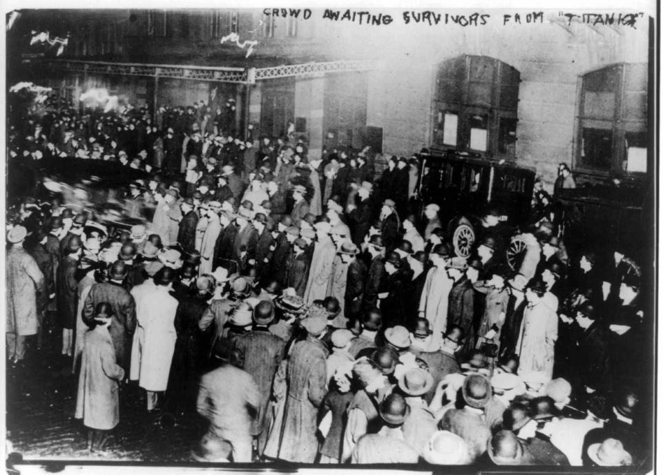 A crowd awaits to get a glimpse of the survivors. The photo was taken in New York on 18 April - three days after the ship sank.