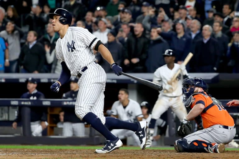 Aaron Judge of the New York Yankees hits a double during the eighth inning against the Houston Astros in Game Four of the American League Championship Series, at Yankee Stadium in New York, on October 17, 2017