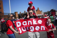 Fans greet Liverpool's manager Jurgen Klopp ahead the English Premier League soccer match between Liverpool and Wolverhampton Wanderers at Anfield Stadium in Liverpool, England, Sunday, May 19, 2024. (AP Photo/Jon Super)