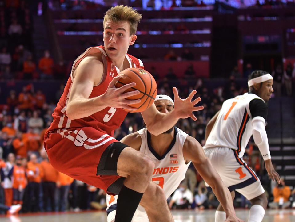 Wisconsin forward Tyler Wahl moves past Illinois guard Jacob Grandison during UW's 80-67 loss at State Farm Center on Feb. 2, 2022. It was one of just two losses for the Badgers on the road last season in the Big Ten. The Badgers went 8-2 overall in Big Ten road games and 9-2 in all road games.