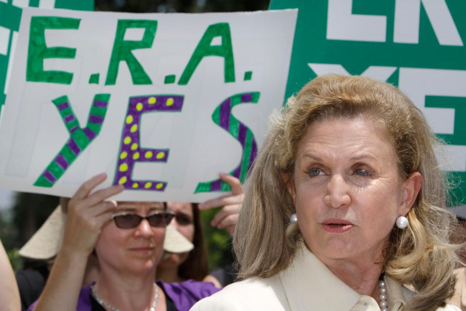 Rep. Carolyn Maloney, D-N.Y., right, speaks on Capitol Hill in Washington, Wednesday, June 22, 2011, where she announced the re-introduction of the Equal Rights Amendment.