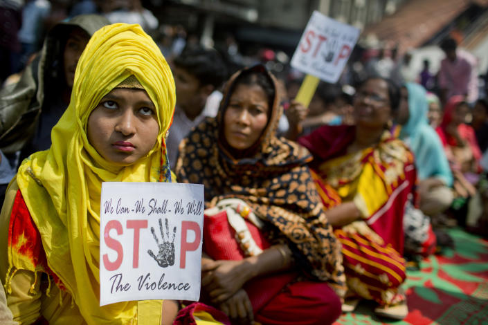 <p>Bangladeshi women hold placards during a rally to mark the International Women’s Day in Dhaka, Bangladesh, Thursday, March 8, 2018. (Photo: A.M. Ahad/AP) </p>
