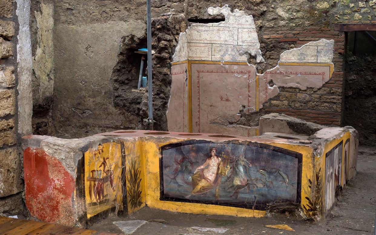  The Thermopolium of Regio V, one of the oldest snack bars in Pompeii - Luigi Spina/Luigi Spina