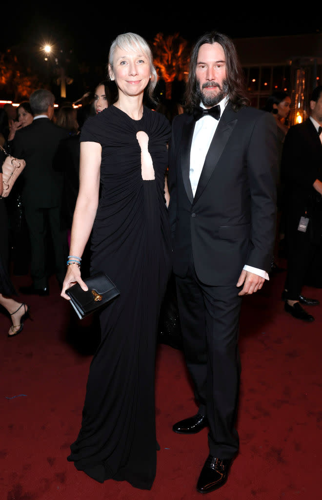 Alexandra Grant and Keanu Reeves, wearing Gucci, attend the 2023 LACMA Art+Film Gala, Presented By Gucci at Los Angeles County Museum of Art on November 04, 2023 in Los Angeles, California