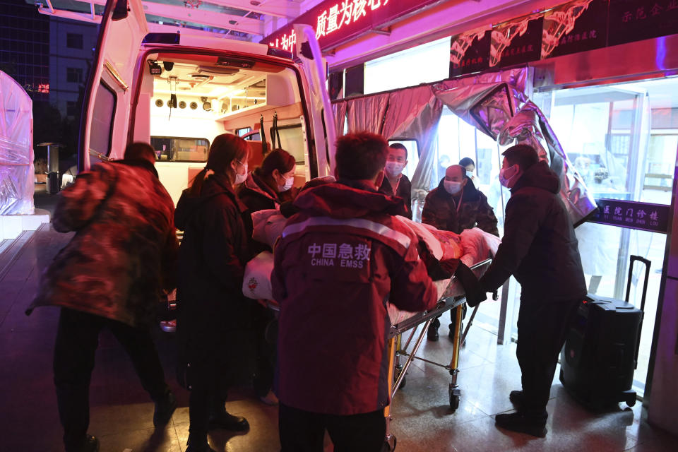 In this photo released by Xinhua News Agency, a person injured in an earthquake is transferred to a hospital in Jishishan Bao'an, Dongxiang, Sala Autonomous County of Linxia Hui Autonomous Prefecture, northwest China's Gansu Province, Tuesday, Dec. 19, 2023. At least 100 people were killed in a magnitude 6.2 earthquake in a cold and mountainous region in northwestern China, the country's state media reported on Tuesday. (Fan Peishen/Xinhua via AP)