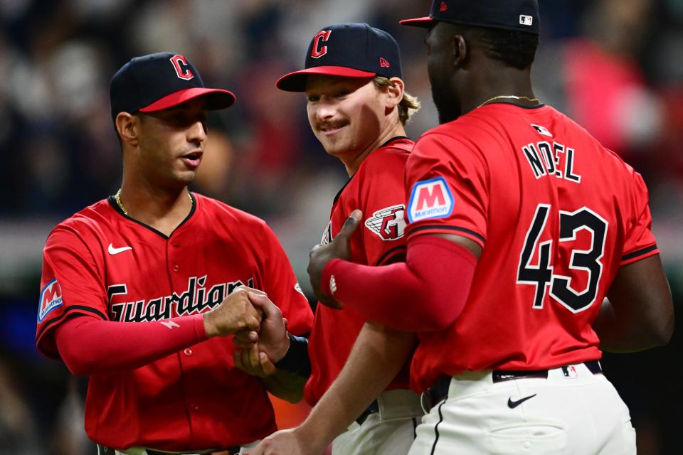 Cleveland Guardians designated hitter Kyle Manzardo, middle, celebrates with Brayan Rocchio, left and Jhonkensy Noel (43) after the Guardians beat the Minnesota Twins on Monday in Cleveland.