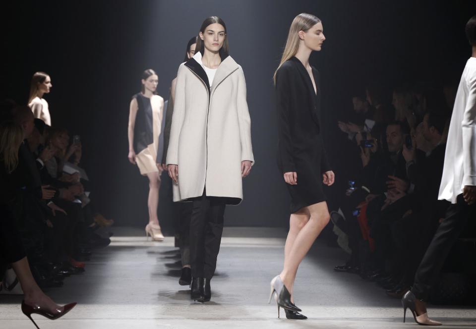 Models walk the runway during the showing of the Narciso Rodriguez Fall 2014 collection at Fashion Week in New York, Tuesday, Feb. 11, 2014. (AP Photo/Kathy Willens)