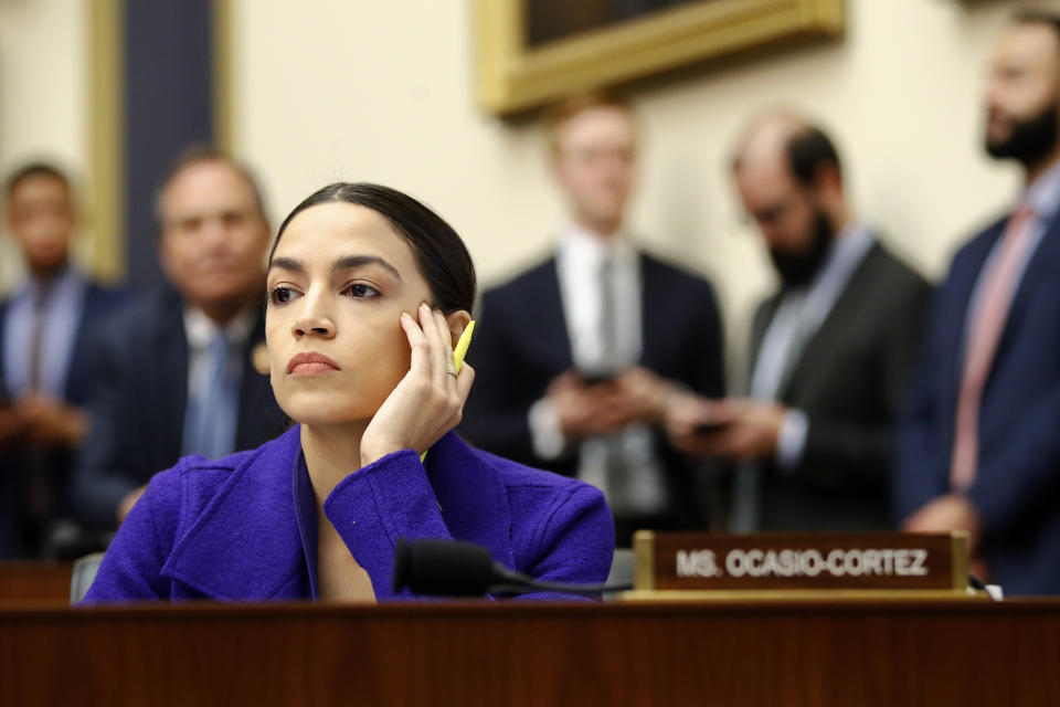 Rep. Alexandria Ocasio-Cortez, D-N.Y., listens during a House Financial Services Committee hearing with leaders of major banks, Wednesday, April 10, 2019, on Capitol Hill in Washington. (AP Photo/Patrick Semansky)