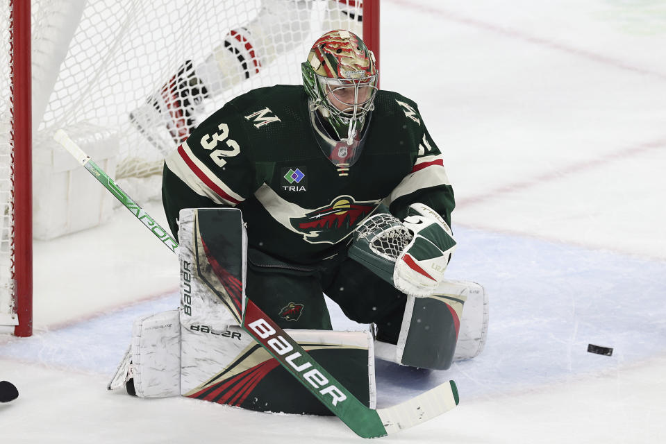 Minnesota Wild goaltender Filip Gustavsson (32) blocks the net during the first period of an NHL hockey game against the Chicago Blackhawks, Saturday, March 25, 2023, in St. Paul, Minn. (AP Photo/Stacy Bengs)